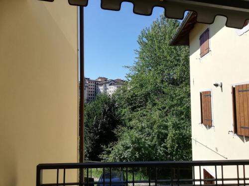 a view from the window of a building at Casetta next to the Creek Sebastiano Ricci in Belluno