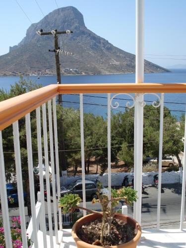 a balcony with a view of a mountain at Tatsis Apartments in Masouri