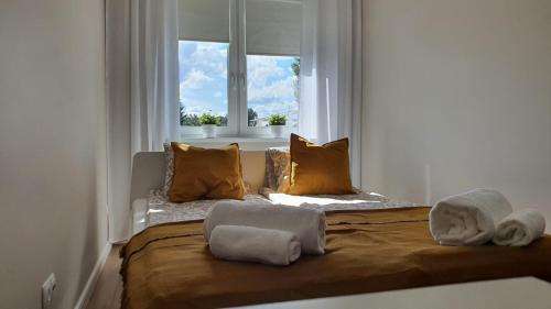 Posteľ alebo postele v izbe v ubytovaní Apartament WILKASY (k. Giżycka)