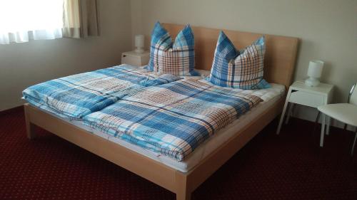 Postel nebo postele na pokoji v ubytování Maxl