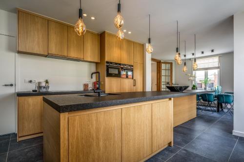 Kuchyň nebo kuchyňský kout v ubytování Maison Chartreuse