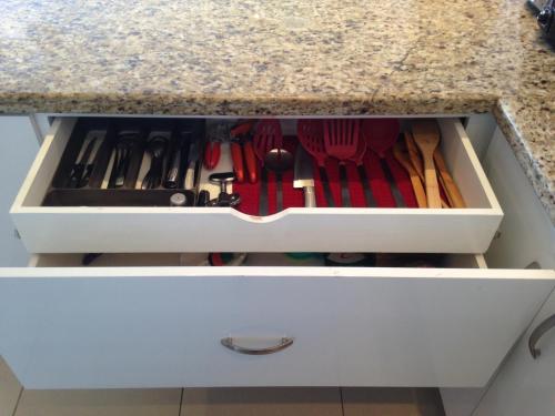 a drawer filled with utensils in a kitchen counter at Estudio 310 Nuevo Vallarta, frente al mar, totalmente equipado y amueblado! in Nuevo Vallarta 