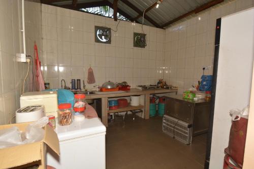 Kuchyň nebo kuchyňský kout v ubytování Hemingway Cottage 海明威度假屋