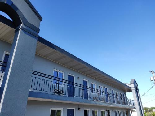 an exterior view of a building with a balcony at Cedar Cove in Sandusky