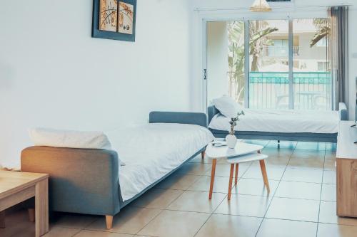 O zonă de relaxare la Elegant 1 Bedroom Apartment - Great Kings Resort Protaras, Kapparis