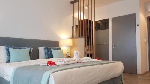 Letto o letti in una camera di La Mariposa Mauritius
