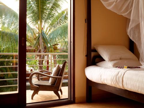 Llit o llits en una habitació de Knai Bang Chatt Resort