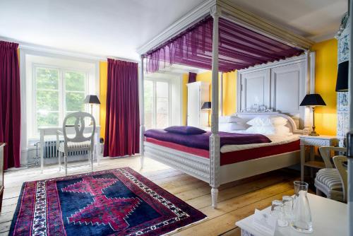 Postel nebo postele na pokoji v ubytování Hotel Hellstens Malmgård