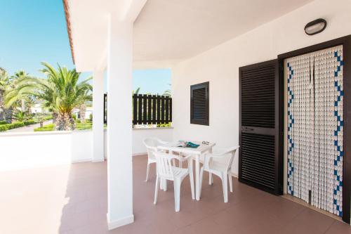 En balkon eller terrasse på Villaggio Club In