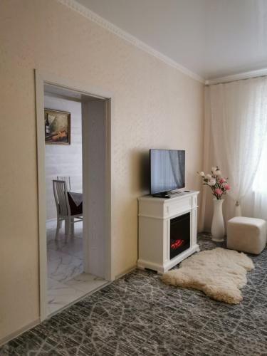 TV a/nebo společenská místnost v ubytování Monte-Kristo Hotel