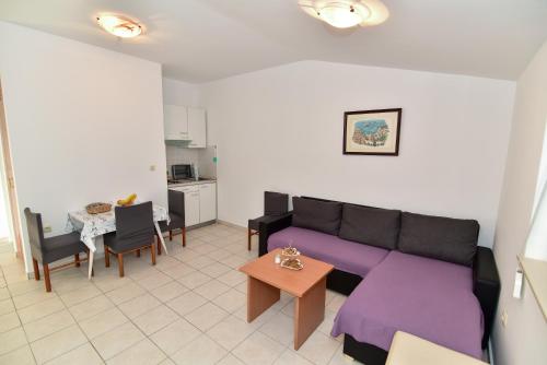 Kuchyň nebo kuchyňský kout v ubytování Apartmani LUNA