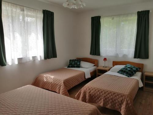 Кровать или кровати в номере Apartments Jure