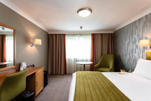 Postel nebo postele na pokoji v ubytování Holiday Inn A55 Chester West by IHG