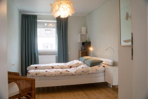 מיטה או מיטות בחדר ב-Ferienhaus Lenchen