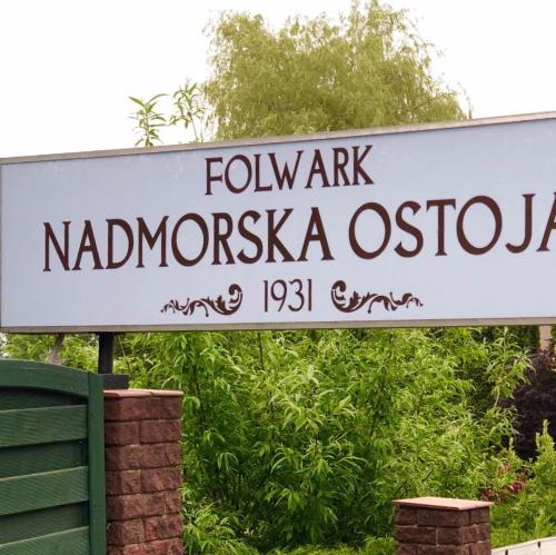 a sign that reads faulkmark nicaraguanaosotaotaolis at Folwark Nadmorska Ostoja in Mechelinki