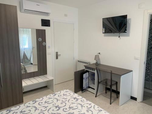 TV a/nebo společenská místnost v ubytování Hotel Aurora