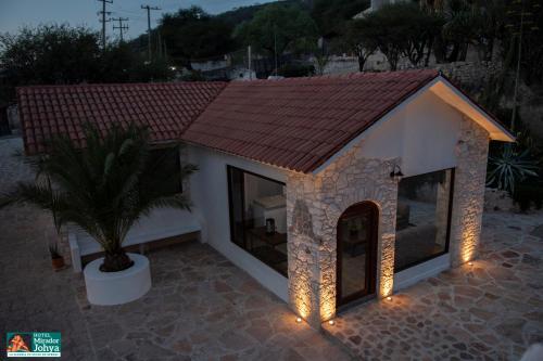 a small dog house with lights on it at Mirador Johya Hotel in Bernal