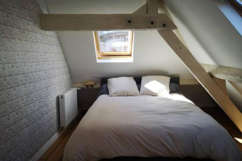Postel nebo postele na pokoji v ubytování Appartement au coeur des remparts