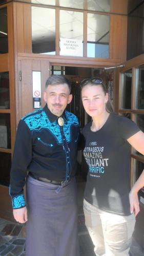 a man and a woman standing next to each other at Hotel Krona Domžale in Domžale