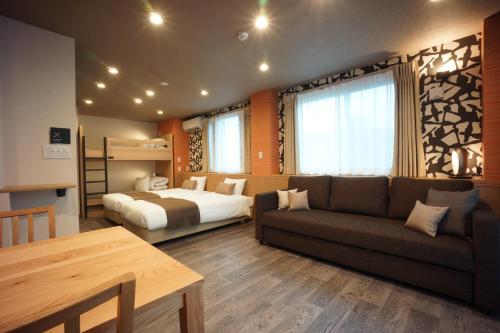 Postel nebo postele na pokoji v ubytování WIRES HOTEL James zaka
