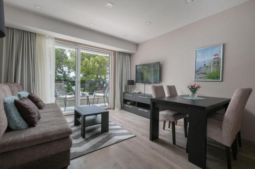 Ruang duduk di Apartman Bella