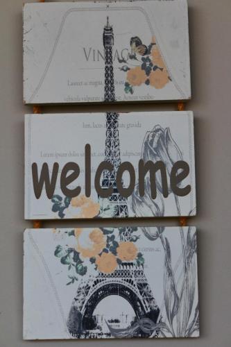 three books with the eiffel tower on them at Sighnaghi Inn in Sighnaghi