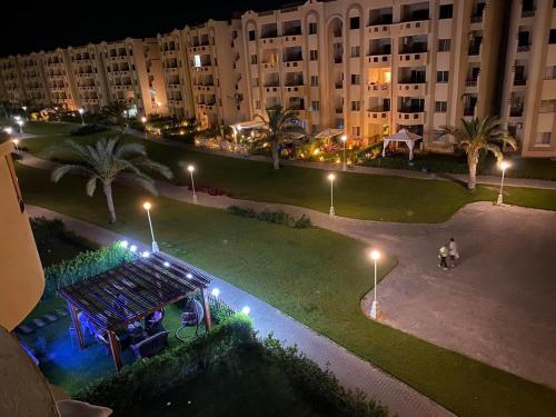 an aerial view of a park at night with buildings at Mohamed Afifi Stella Heights - Sidi Abdel Rahman - Families - 3 Bed rooms in El Alamein