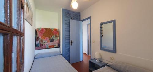 Ένα ή περισσότερα κρεβάτια σε δωμάτιο στο Apartamento en Playa Son Bou
