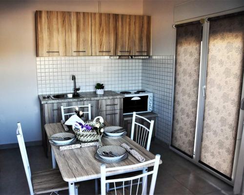Η κουζίνα ή μικρή κουζίνα στο Magdalena Seaside Apartments