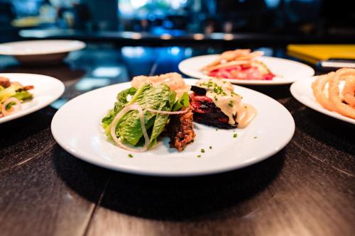 a plate of food on a wooden table at Hundred House Hotel in Ironbridge