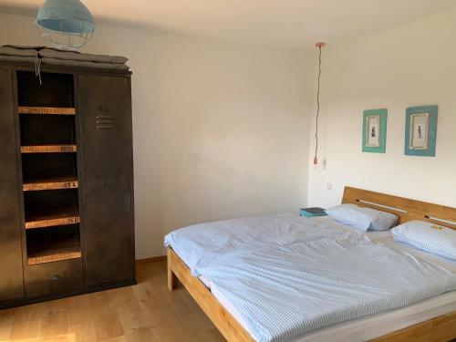 Ένα ή περισσότερα κρεβάτια σε δωμάτιο στο Ferienhaus Poppenhausen