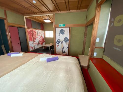 ㉑宿KUKAI 新今宮にあるベッド