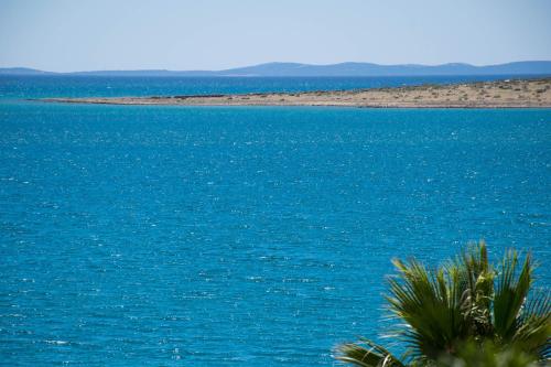 a view of a large body of water at Apartment Rino, only 30m from the sea in Pag