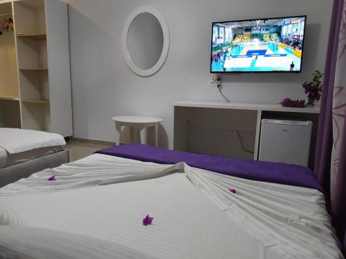 Cama ou camas em um quarto em Hotel Elisabet