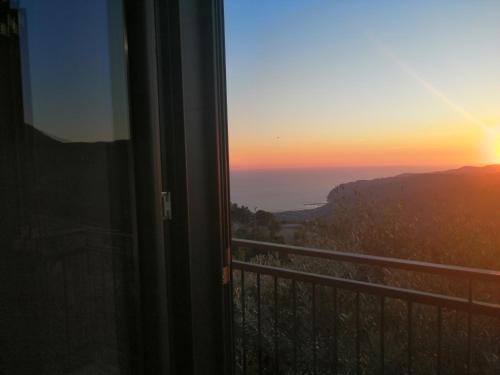 a view of the sunset from a balcony at Agricoltura Rascio in San Mauro Cilento