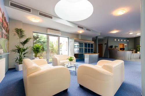 Χώρος καθιστικού στο HOTEL A4 Airport Kraków MOP Morawica