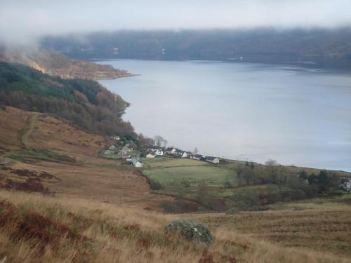 a view of a lake with houses on a hill at Rowan House B&B Rooms & A Self Catering Apartment in Lochgoilhead