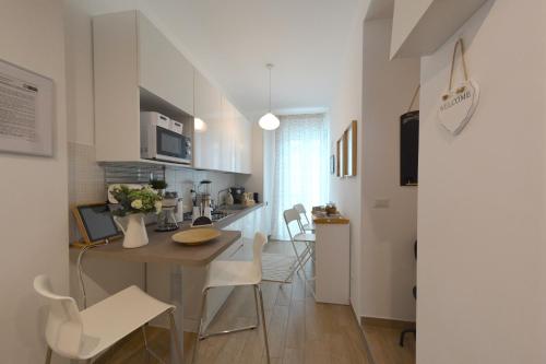 Kuchyň nebo kuchyňský kout v ubytování Al Settimo Piano