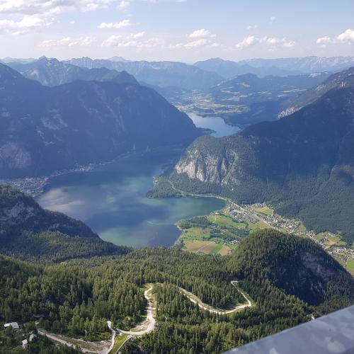 an aerial view of a lake in the mountains at Ferienwohnung Alpenrose in Goldegg