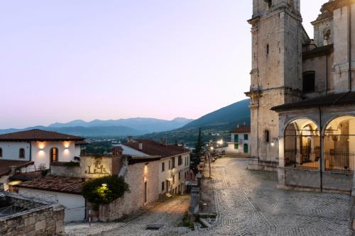 a view of an old town at dusk at Il Lavatoio Dimora Storica in Castel di Sangro