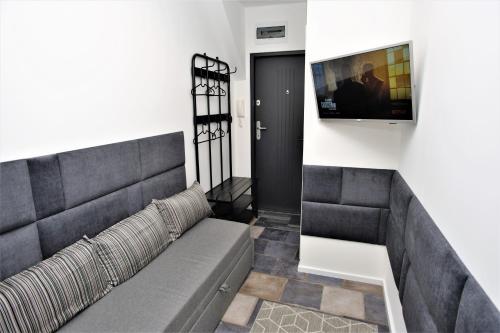 Posedenie v ubytovaní Mikro Apartament Solo na Starówce 8m2