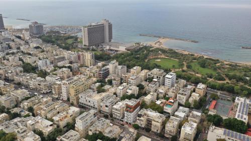 an aerial view of a city next to the ocean at Mr. Ben Yehuda - By TLV2GO in Tel Aviv