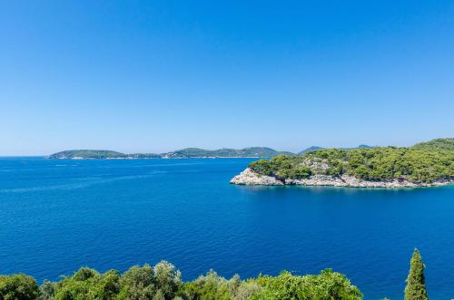 an island in the middle of a large body of water at Villa Paradiso 2 in Dubrovnik