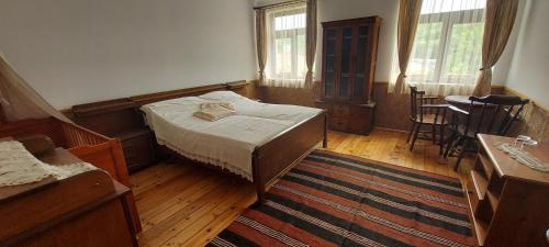 Ένα ή περισσότερα κρεβάτια σε δωμάτιο στο Хаджи Марковата къща за гости гр.Дряново