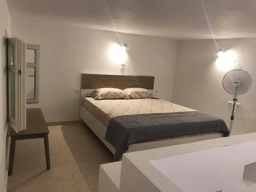 Ένα ή περισσότερα κρεβάτια σε δωμάτιο στο Dimitris apartments