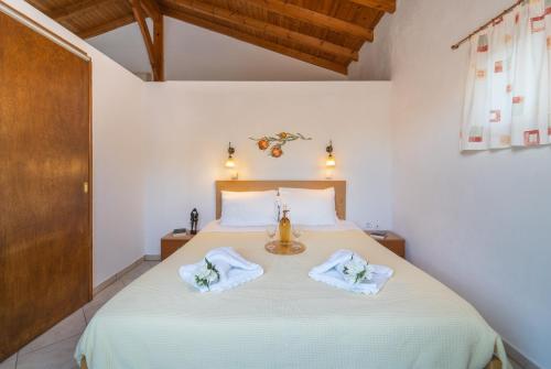 Ένα ή περισσότερα κρεβάτια σε δωμάτιο στο Cavo Gallo