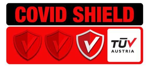 a red and white sign with the words squad shield at Iraklion Hotel in Heraklio Town