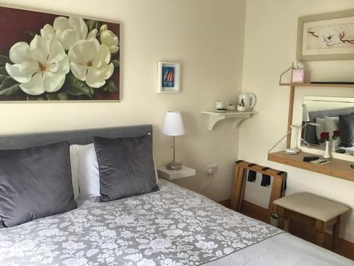 Cama o camas de una habitación en Ballyvaughan Lodge Guesthouse