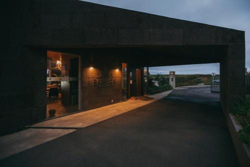 an entrance to a building with an open door at Santa Barbara Eco-Beach Resort in Ribeira Grande