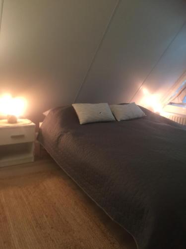 מיטה או מיטות בחדר ב-Guesthouse "Cosmea"